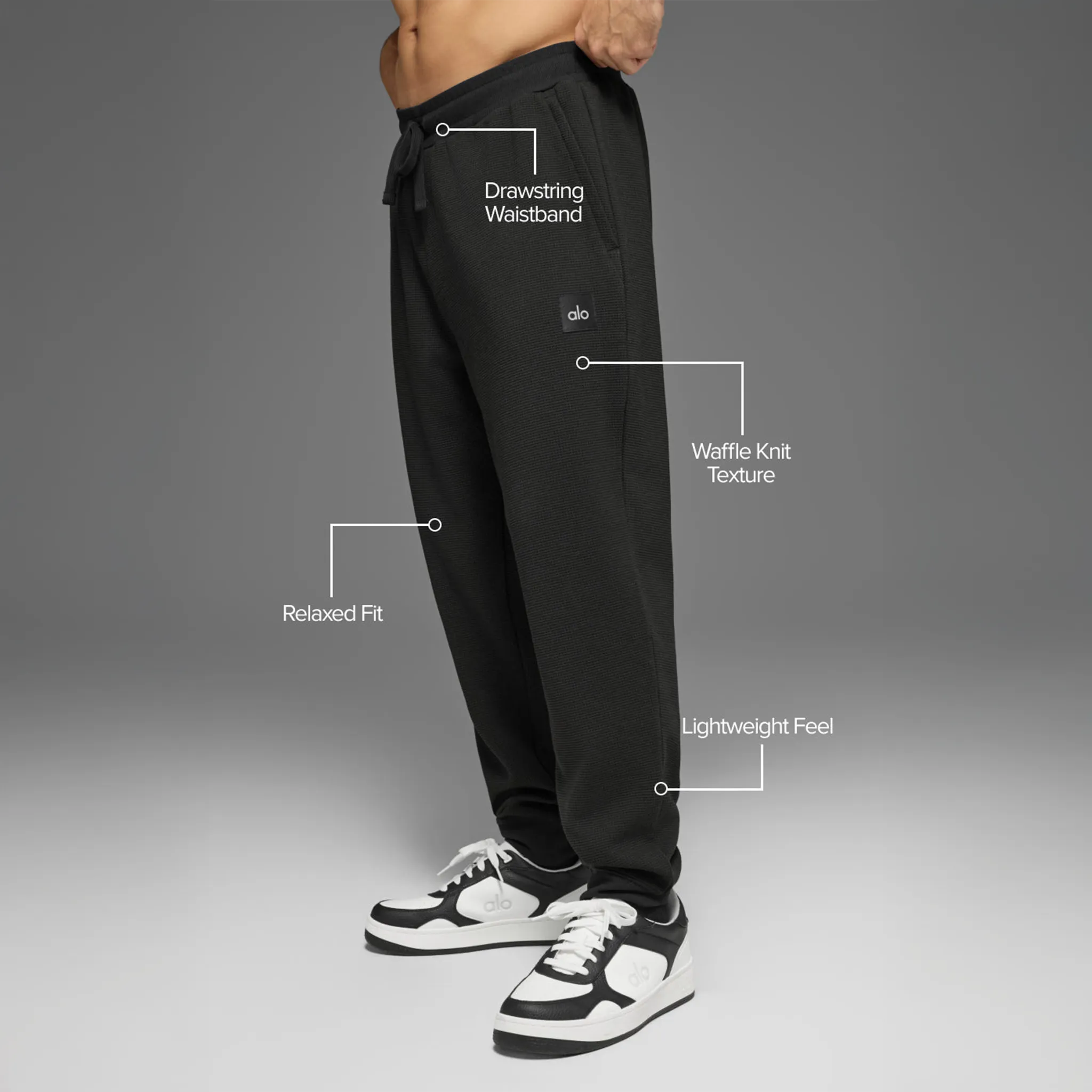 Model Side View of Alo Yoga Waffle Lounge Black Sweatpants